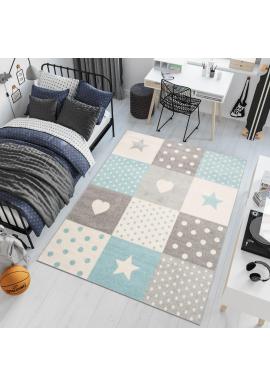 Fehér és türkiz színű, mintás szőnyeg